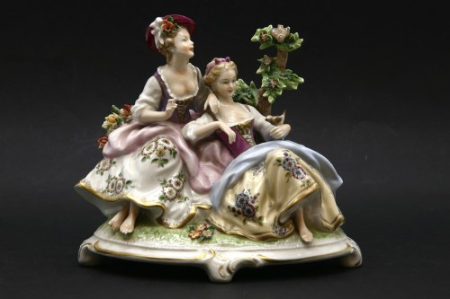Lot 705 - A Continental porcelain figure group of ladies in traditional costume