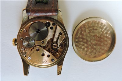 Lot 603 - A gentlemen's 9ct gold Omega mechanical strap watch