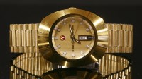 Lot 622 - A gentlemen's gold plated Rado Diastar 636.0013.3 automatic day date bracelet watch