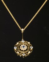 Lot 100 - An Edwardian aquamarine and split pearl pendant
