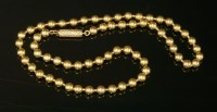 Lot 29 - A cased Victorian gold bead necklace