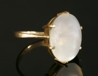 Lot 106 - A Continental high carat gold single stone moonstone ring
