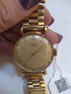 Lot 609 - A gentlemen's 9ct gold Ebel automatic strap watch