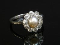 Lot 150 - An Art Deco split pearl and diamond daisy cluster ring