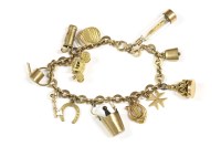 Lot 77 - A gold charm bracelet with twelve assorted charms