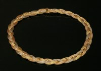 Lot 227 - An Italian three colour gold plaited mesh necklace