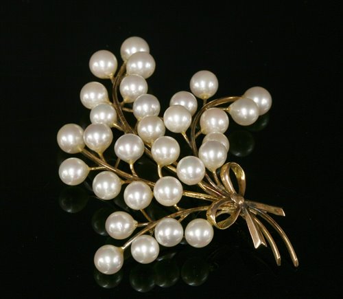 Lot 228 - A gold, cultured pearl spray brooch