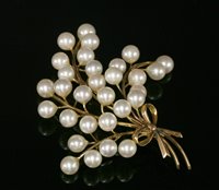 Lot 228 - A gold, cultured pearl spray brooch