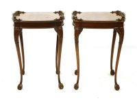 Lot 384 - A pair of mahogany lamp tables