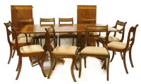 Lot 443 - An inlaid and painted mahogany Regency design dining table and chairs