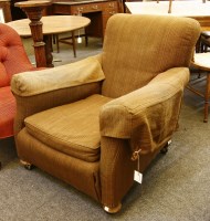 Lot 398 - A 1930s club armchair with a brown cover