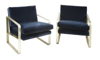 Lot 470 - A pair of steel and upholstered loungers