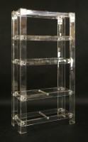 Lot 650 - A five-tier lucite stand