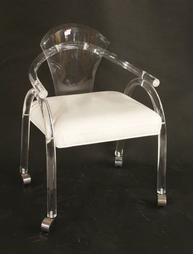 Lot 648 - A lucite desk chair
