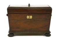 Lot 687 - A 19th century gadrooned rosewood tea caddy