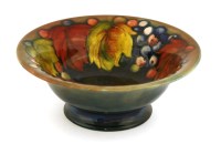 Lot 330 - A Moorcroft leaf and berry flambé bowl