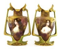 Lot 127 - A pair of Royal Bonn twin-handled pottery vases