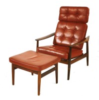 Lot 656 - A rosewood lounger and ottoman