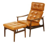 Lot 609 - A rosewood lounger and ottoman