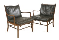 Lot 703 - A pair of rosewood 'Colonial' chairs