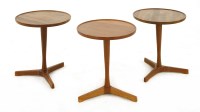 Lot 569 - Three teak circular tables