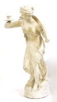 Lot 487 - A white painted plaster statue of a classical maiden with outstretched arm