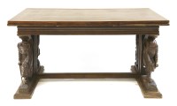 Lot 380 - A continental oak draw leaf table
