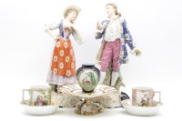 Lot 227 - A pair of late 19th century Volkstedt porcelain figures of a galliant and maiden dressed in traditional costume