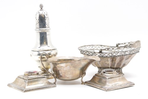 Lot 105 - A hallmarked silver shaker of baluster form (worn hallmarks)