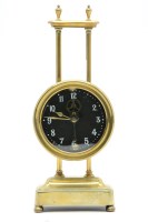 Lot 154 - A brass 'Gravity' mantel clock