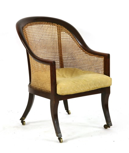 Lot 461 - A 19th century mahogany tub form library chair