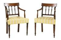 Lot 378 - A pair of George IV mahogany bar back elbow chairs