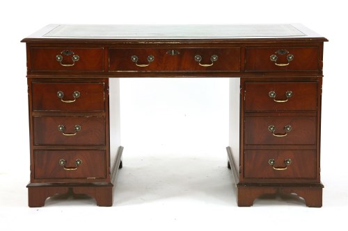 Lot 353 - A reproduction mahogany pedestal desk