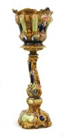 Lot 421 - A Victorian majolica jardinière and stand