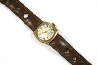 Lot 93 - A collection of items to include a gentlemen's 9ct gold mechanical strap watch