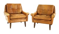 Lot 490 - A pair of Danish tan leather armchairs