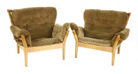 Lot 518 - A pair of Danish oak model 4521 lounge armchairs