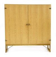 Lot 517 - A Danish oak cupboard