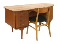 Lot 506 - A Danish teak desk