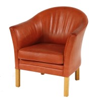 Lot 680 - A Danish red leather armchair