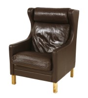 Lot 542 - A Danish brown leather armchair