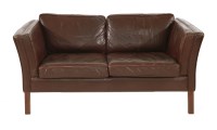 Lot 546 - A Danish brown leather two-seater settee