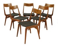 Lot 457 - A set of six teak boomerang dining chairs