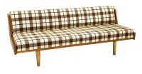 Lot 371 - An oak and upholstered sofa bed