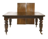 Lot 500 - A late Victorian dining table with two extra leaves