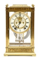 Lot 153 - A late 19th century American four glass mantel clock