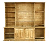 Lot 494 - A large 19th century pine breakfront bookcase