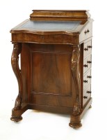Lot 395 - A Victorian walnut davenport desk