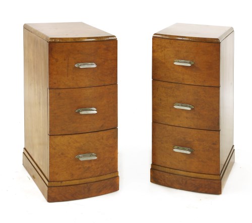 Lot 212 - A pair of Art Deco walnut three-drawer chests