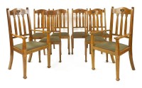Lot 65 - A set of eight James Shoolbred oak Arts and Crafts dining chairs